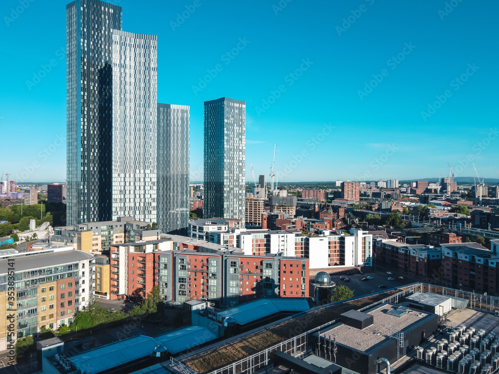 Naklejka premium Manchester City Centre Drone Aerial View Above Building Work Sky