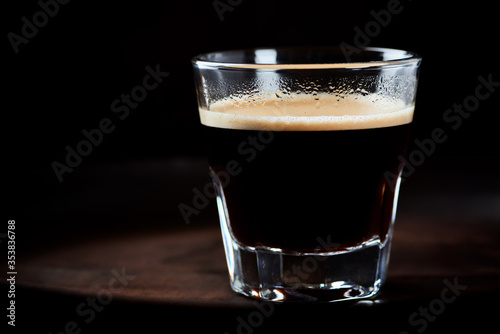 Cup of espresso on dark background. Close up. 