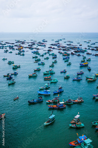 Traditional fishermen boats lined in the harbor of Duong Dong town in the popular Hon Thom and Phu Quoc island