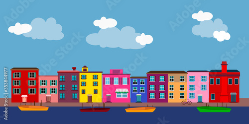 
Burano island Venice Italy with colorful houses boats and yards