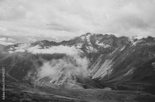 Cloudy sky with view of a mountain range in South Tyrol