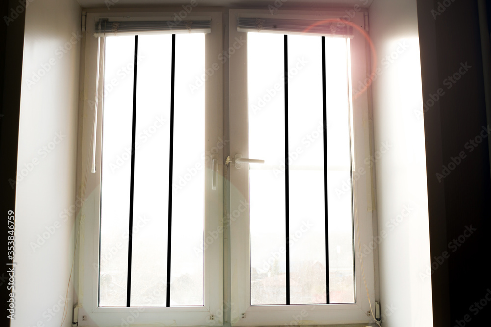 Sunshine goes throught white window Sunshine goes throught white window