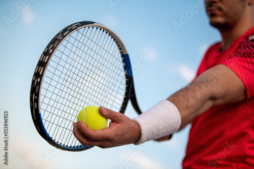 Young man playing tennis. © ivanko80