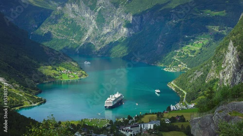 Timelapse of Geiranger fjord, Norway with cruise liner ship and boats 