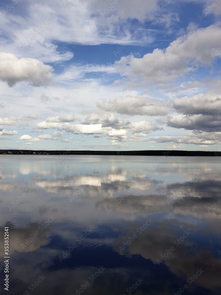 The sky is reflected in the lake