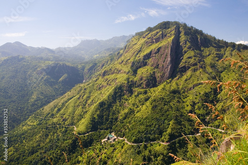 Obraz na plátně Top view of a winding mountain road.
