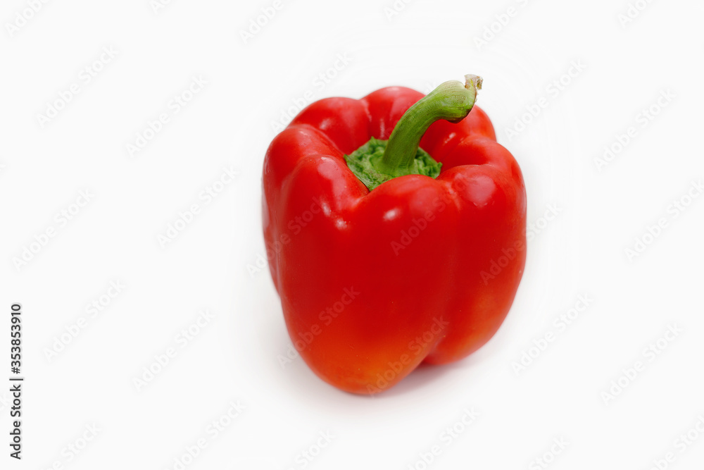 Red bell pepper on a white background. Isolate Fresh vegetables, vitamins, healthy nutrition