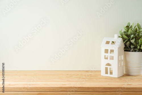 Wooden table background with home decor objects.
