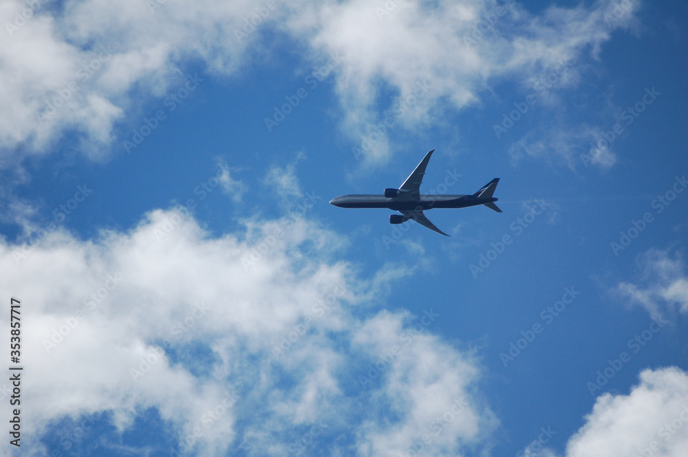 airplane on the cloudy sky airplane on the cloudy sky