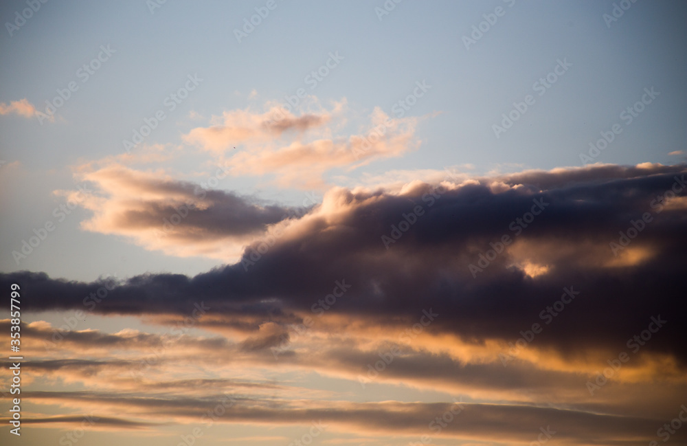 Beautiful magnificent clouds at sunset in the sky