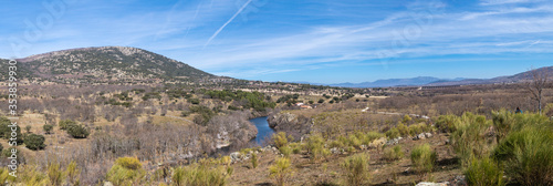 Panoramic view of the Arroyo Canencia course along the municipality of Lozoya, Madrid, Spain