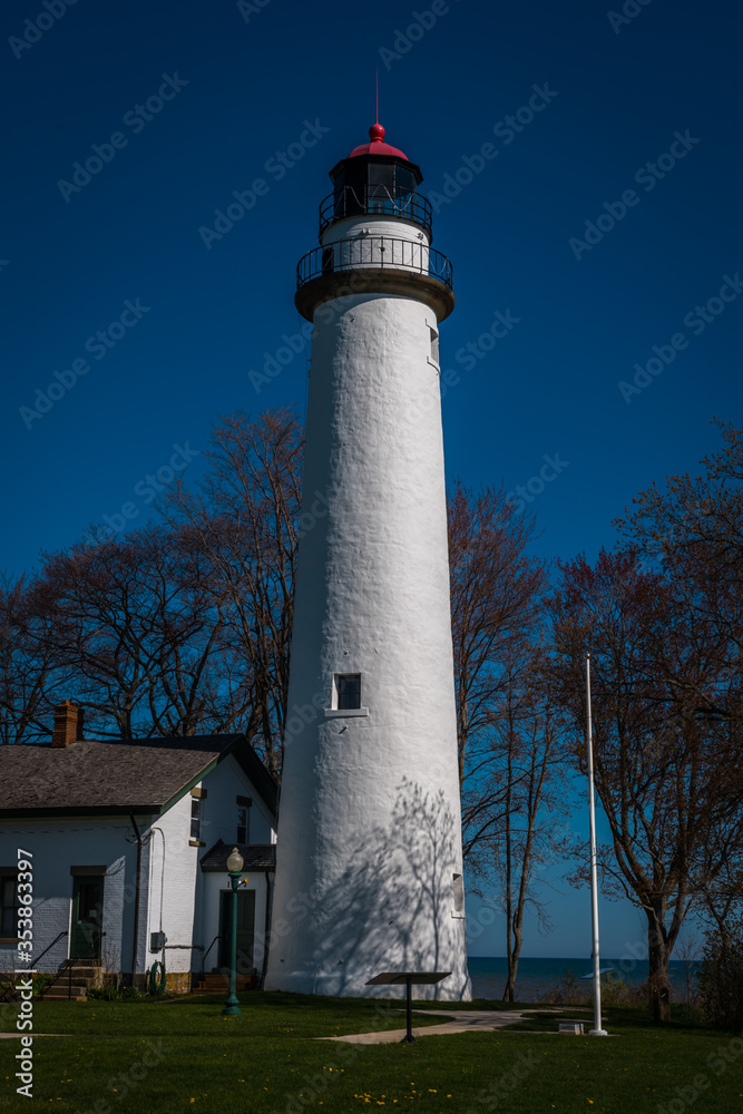 Port Aux Barques lighthouse looking over Lake Huron in Port Hope Michigan on a spring  sunny morning