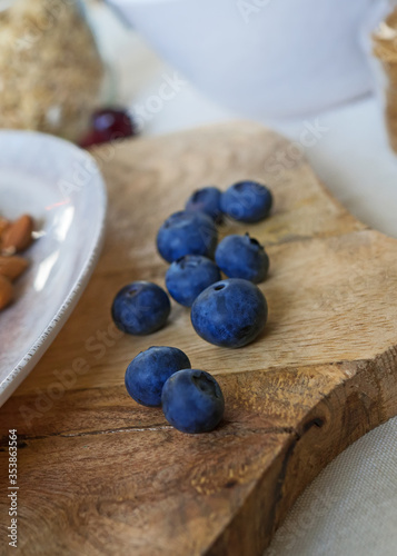 Blueberries on the wooden board. Close-up view.