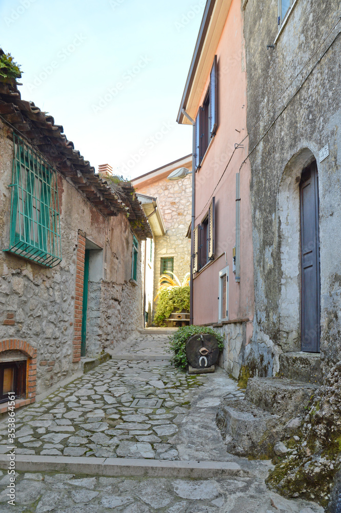 A street between the old houses of a medieval town of Montefalcione in the Irpinia region.