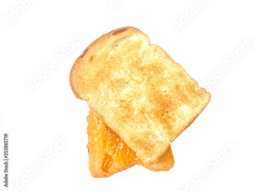 Toast bread with homemade pineapple jam or marmalade, On a white background, toast with honey, Delicious breakfast, Two slices of toast, Close up, Top view