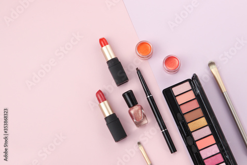 various cosmetics on geometric background