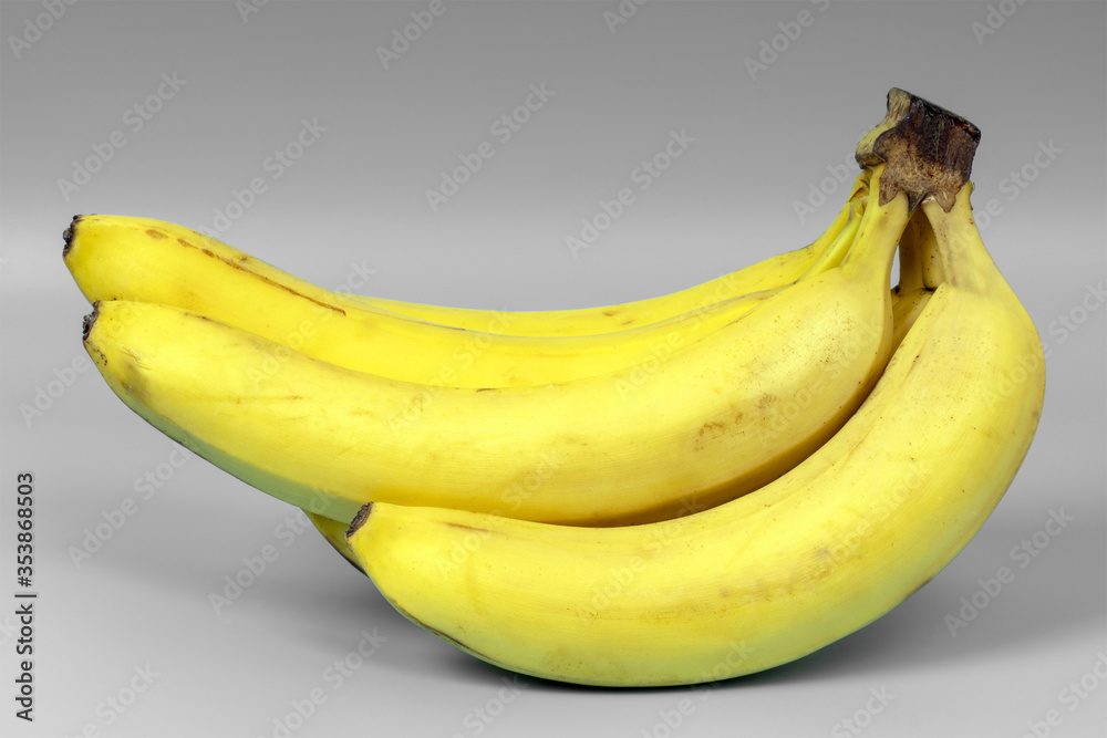 Bananas on a gray background, front view
