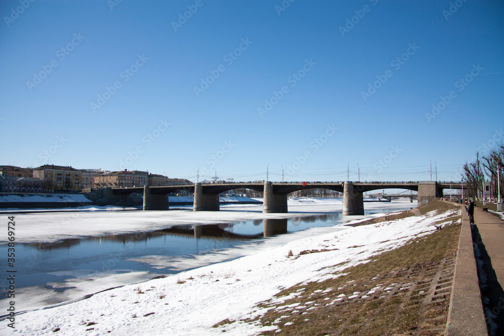 Volga river in march with partially melted ice in sunny day, Tver, Russia. Volga river in march with partially melted ice in sunny day, Tver, Russia.