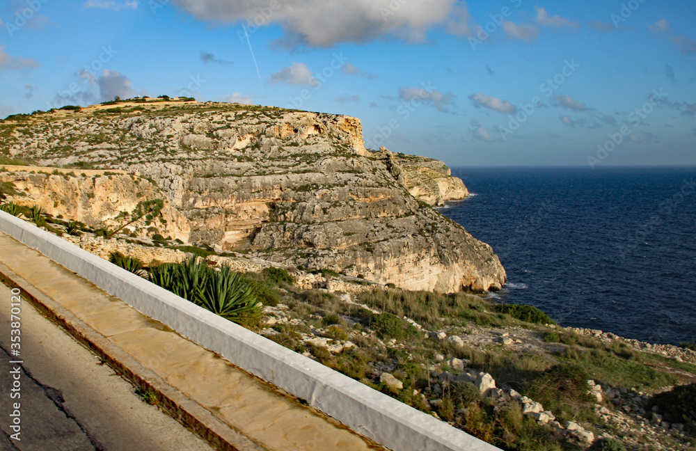 Obraz premium A stratified cliff by the roadside in Malta