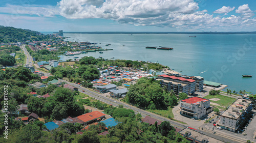 An aerial panorama view of Sandakan Town at Sabah. Sandakan is a city in the Malaysian state of Sabah, on the northeast coast of Borneo. 