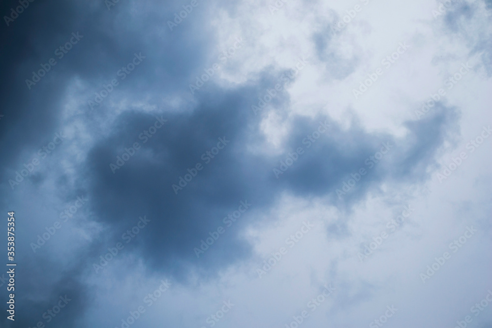 Blue sky with storm clouds. Natural background.