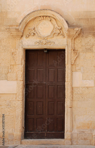 The door of the 18th century Basilica San Niccolo dei Greci in the southern Italian city of Lecce  © dragoncello
