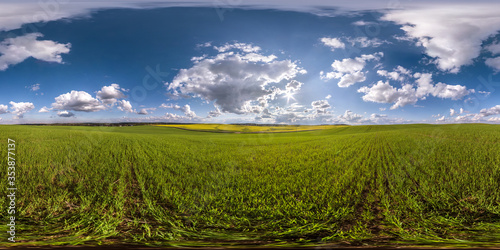 full seamless spherical hdri panorama 360 degrees angle view among fields in summer day with awesome blue clouds in equirectangular projection  ready for VR AR virtual reality