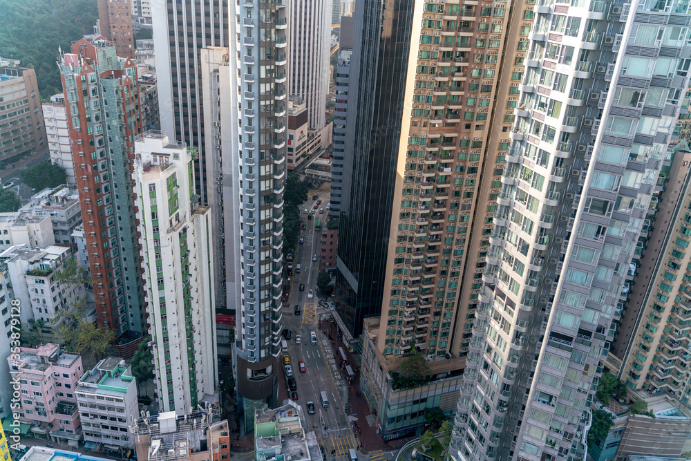 The amazing view of Hong-Kong cityscape full of skyscrapers from the rooftop.