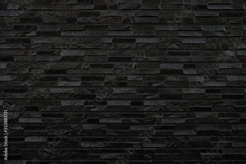 Black Brick Wall Texture Background.