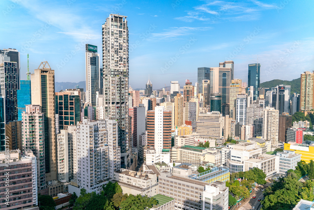 Naklejka premium The amazing view of Hong-Kong cityscape full of skyscrapers from the rooftop.