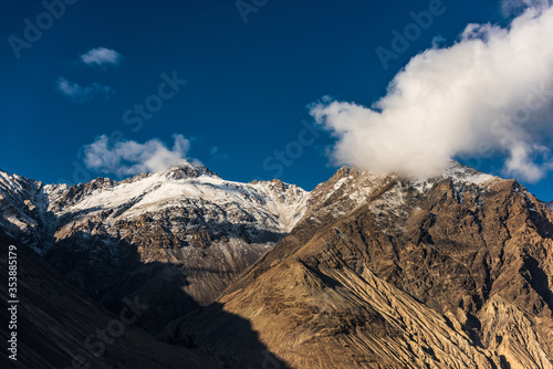 Landscape of snow mountains in Leh Ladakh with cloudy sky