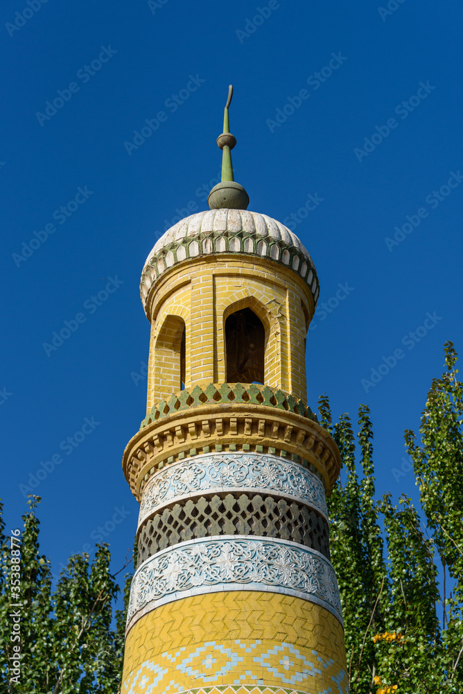 Minaret of 15th century Id Kah Mosque in Kashgar, Xinjiang, China. Largest in China. Minaret of 15th century Id Kah Mosque in Kashgar, Xinjiang, China. Largest in China.