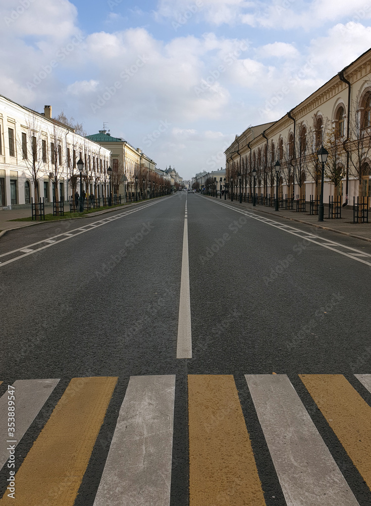 empty road in the city in autumn