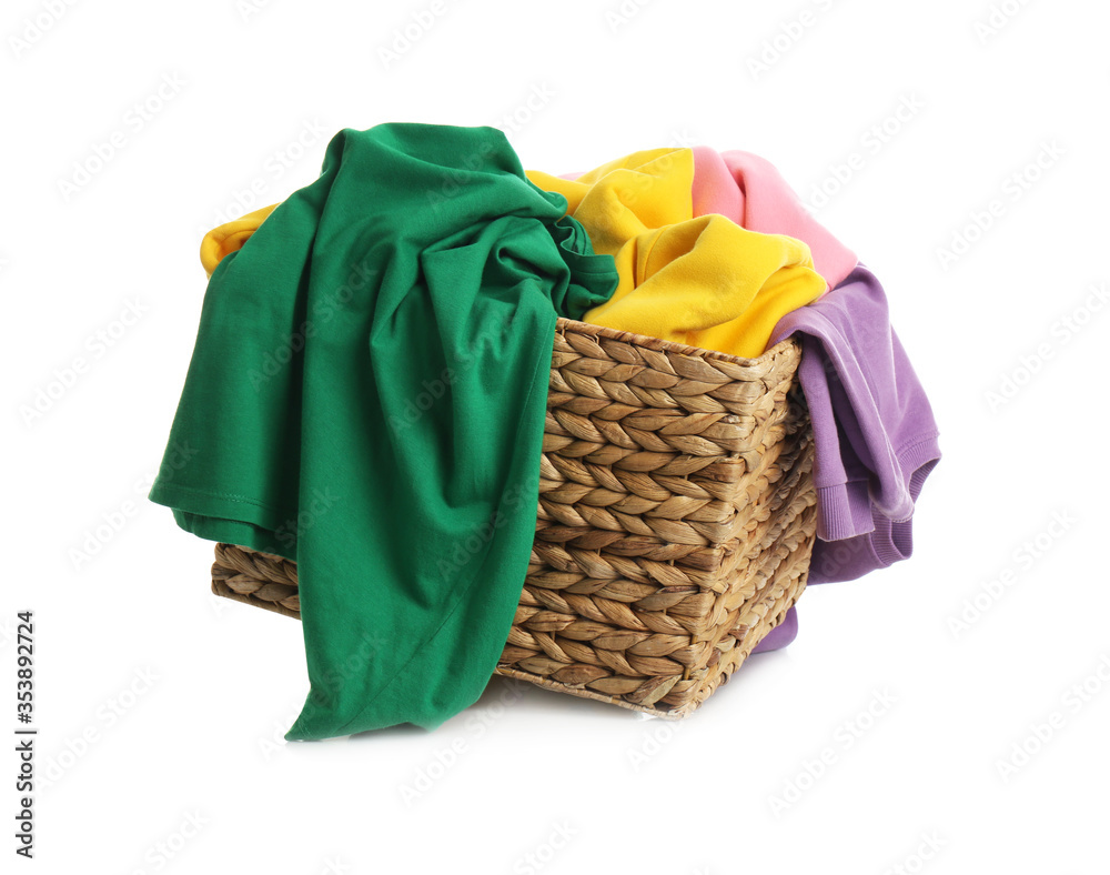 Wicker laundry basket with different clothes isolated on white Wicker laundry basket with different clothes isolated on white