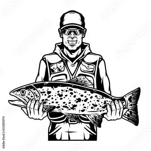 Happy angler holding caught trout fish