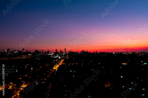 The evening sky in the sky is beautiful color. Of the metropolis of Thailand
