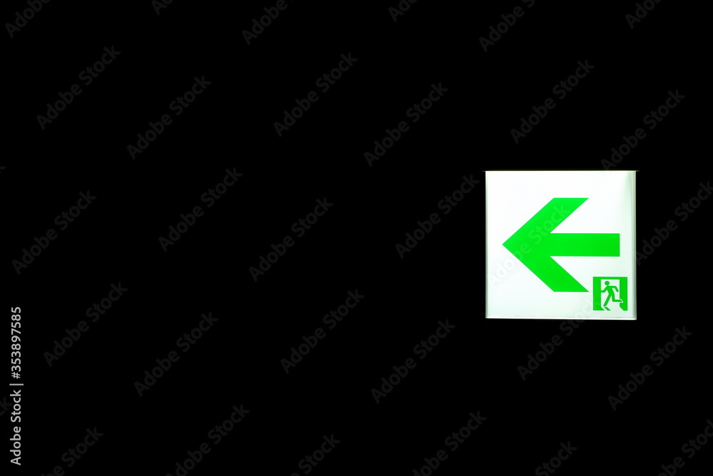 Emergency Exit Sign in the Dark Room. Emergency Exit Sign in the Dark Room.