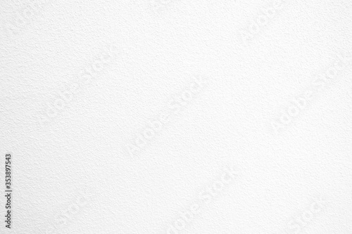 White Concrete Wall Texture Background with Spotlight on Surface.