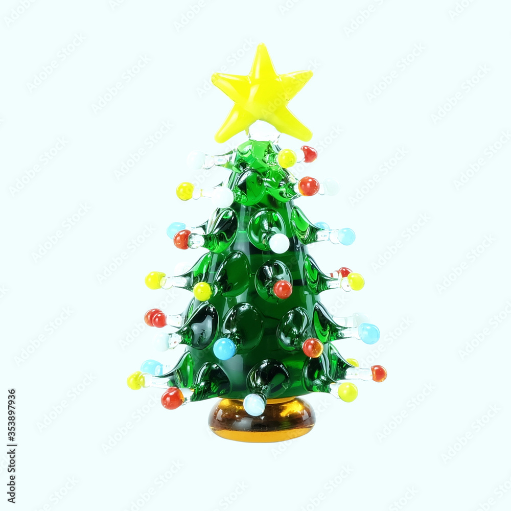 Close up Miniature Glass Christmas Tree Isolated on White Background. Close up Miniature Glass Christmas Tree Isolated on White Background.