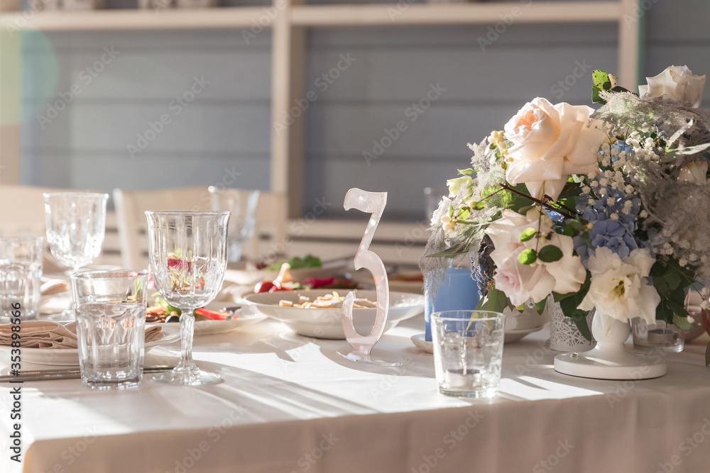 Table set for holiday, event, party or wedding reception in indoor restaurant