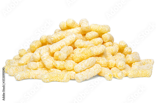 A heap of corn snacks. Sweet sticks of puffcorn photo