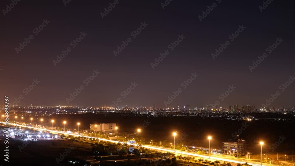 view of cars driving on highway in bangkok thailand at night view of cars driving on highway in bangkok thailand at night