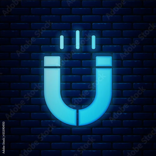 Glowing neon Magnet icon isolated on brick wall background. Horseshoe magnet, magnetism, magnetize, attraction. Vector.
