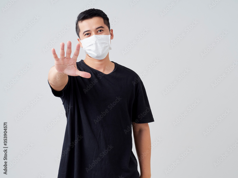 Young man shows a hand stop sign. Young man shows a hand stop sign.