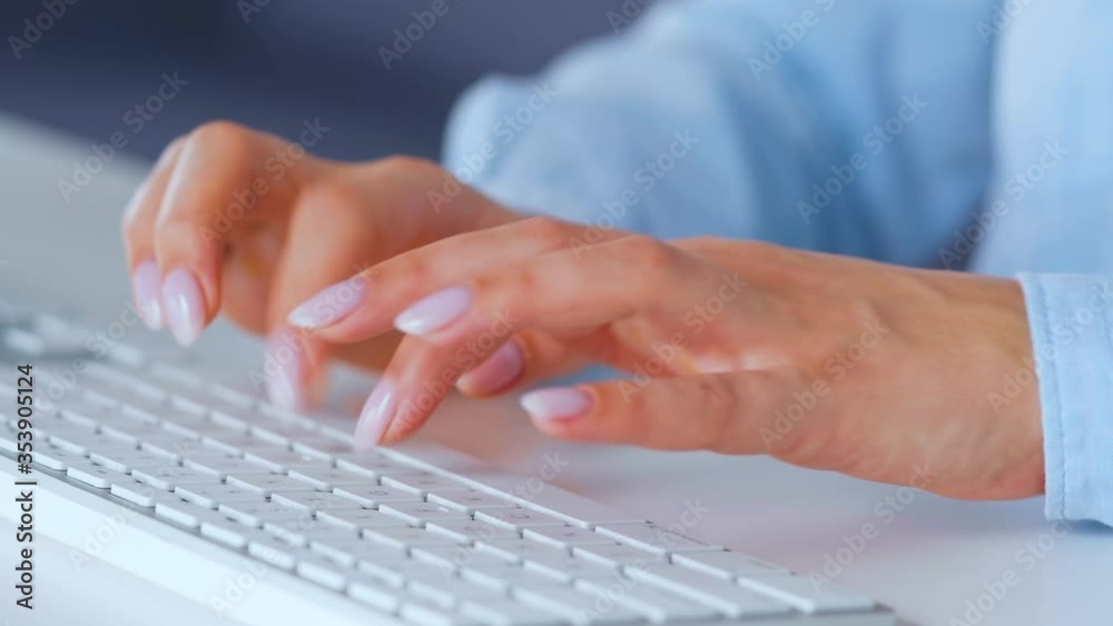 Woman typing on a computer keyboard. Concept of remote work. Woman typing on a computer keyboard. Concept of remote work.