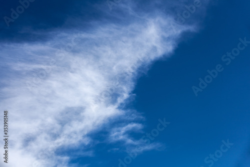 Blue sky background with clouds © plus