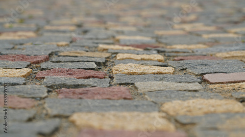 a stone road view from the bottom.The more clear the focus ahead is, the more blurred it becomes.