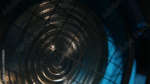 Close up of a Fresnel lens of a professional film light - tungsten lamp