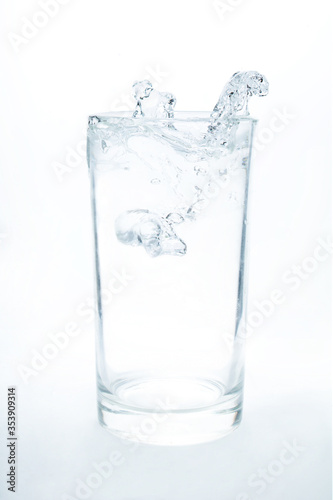 Drink water pouring in to glass