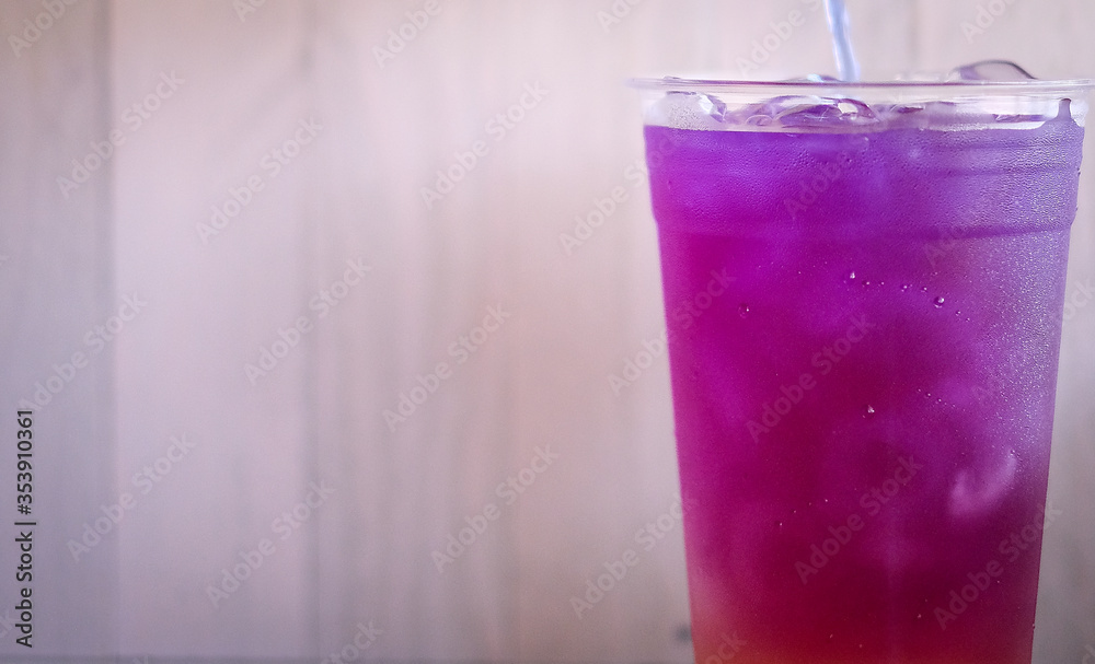 colorful layer of pink and purple herb tea. Butterfly pea tea cold drink for refreshment. colorful layer of pink and purple herb tea. Butterfly pea tea cold drink for refreshment.